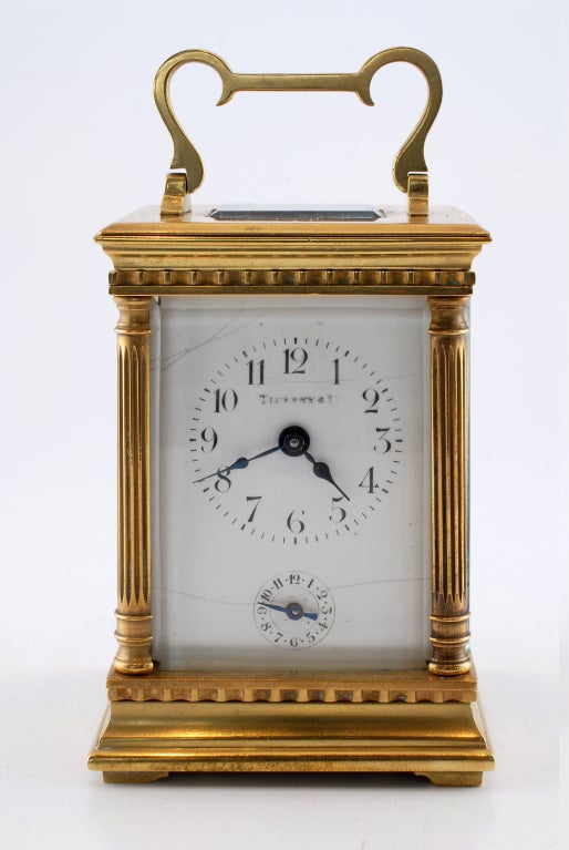 Brass Tiffany carriage-clock in original case and with alarm