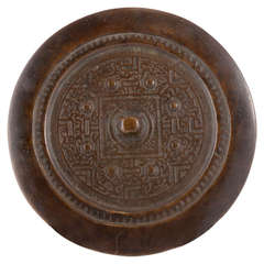 Chinese Qing Dynasty bronze mirror in Archaic style.
