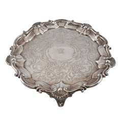 Antique George lll footed silver salver with chased interior and shell dtl.