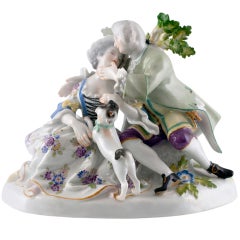 Meissen group of couple with dog