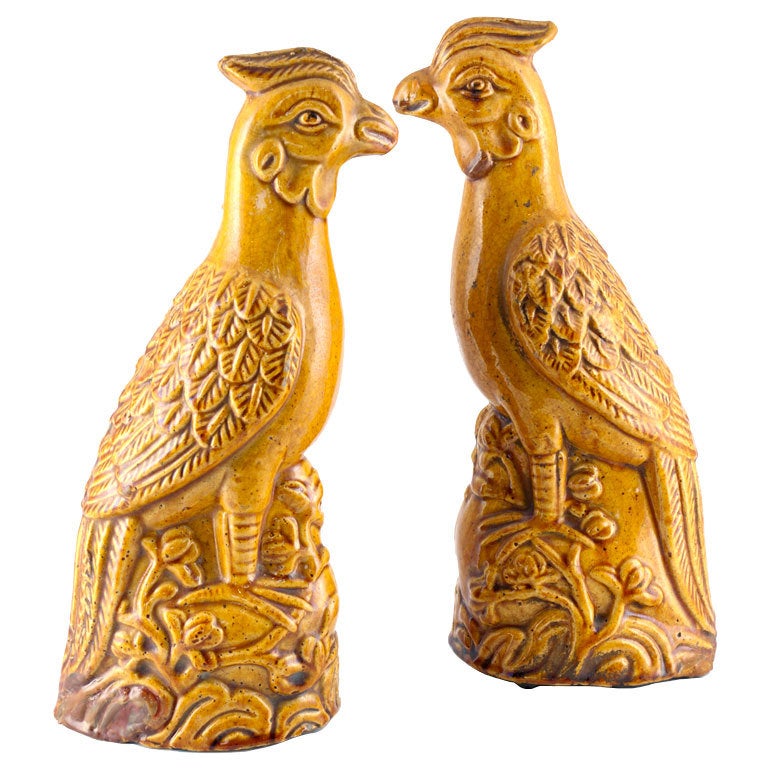 Pair of Tang style birds in yellow glaze For Sale