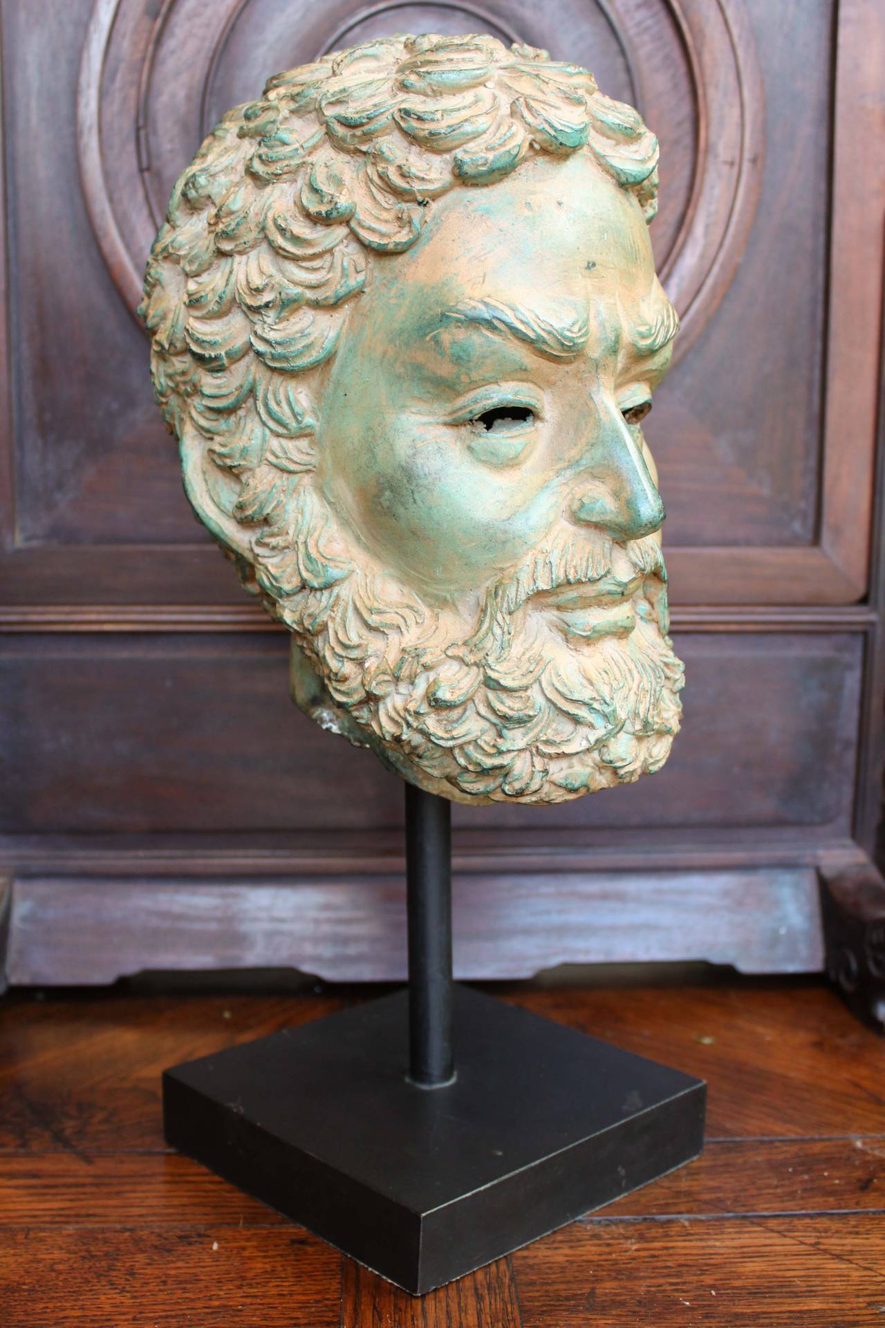 Bronze classical head of a bearded man, mounted on a square pedestal. Highly decorative and beautifully detailed,
20th century.