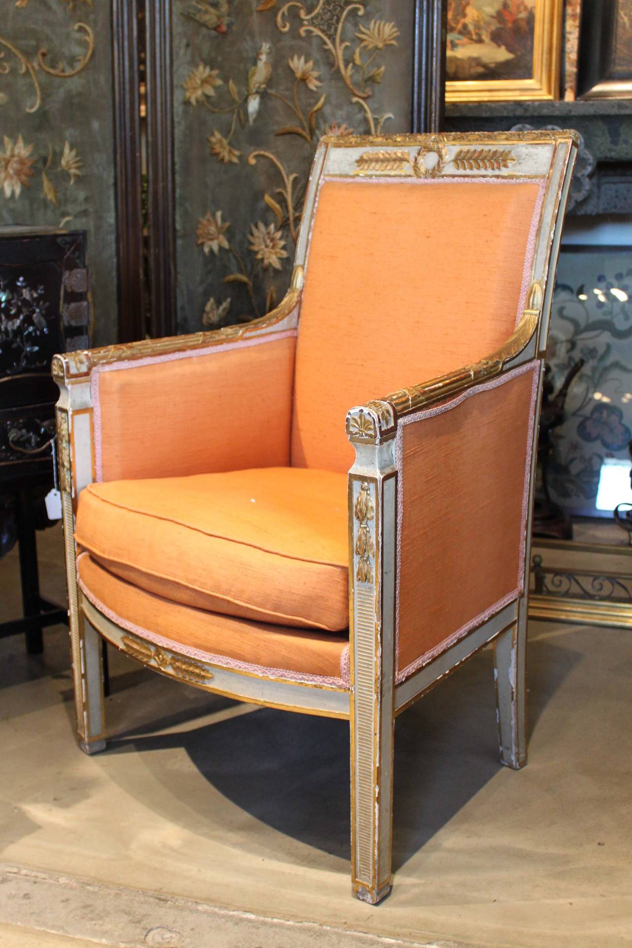 Exceptional French Directoire chair attributed to Jacob Frères with gilded carved Gessoe applique and Napoleonic crest, France, circa 1780.