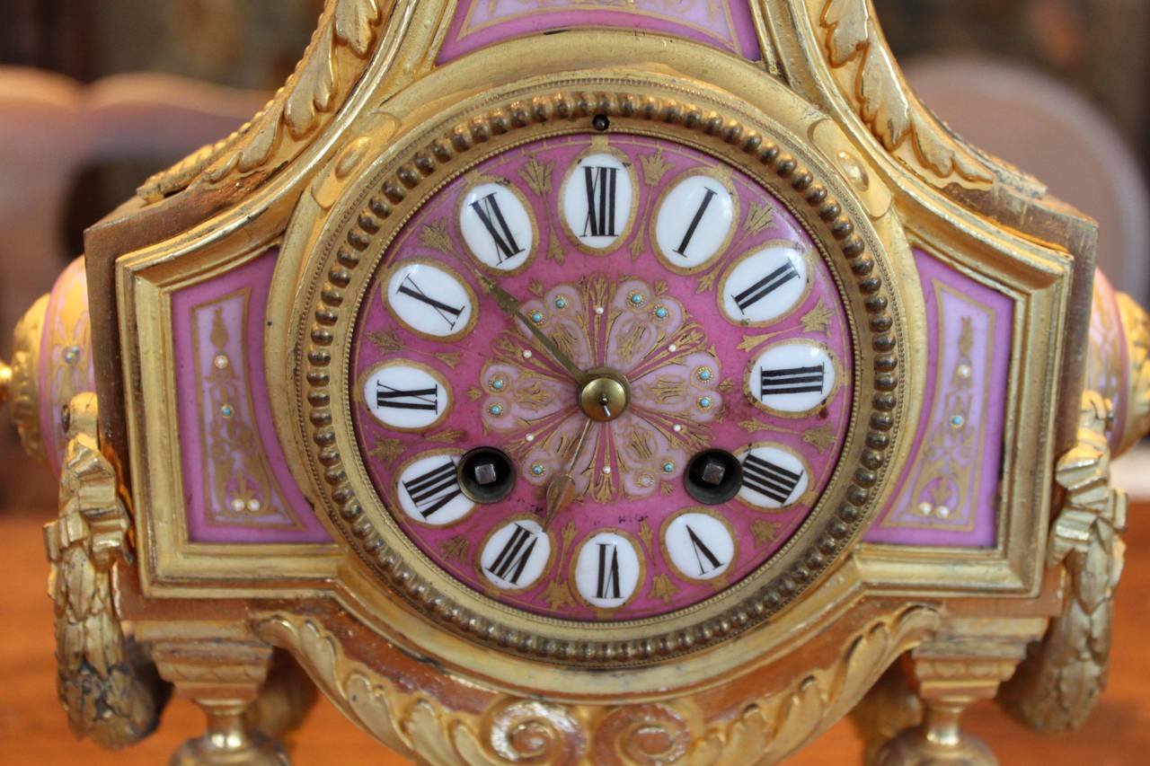 Gilt Ormolu and Sèvres Clock with Candelabras In Good Condition In Vancouver, BC