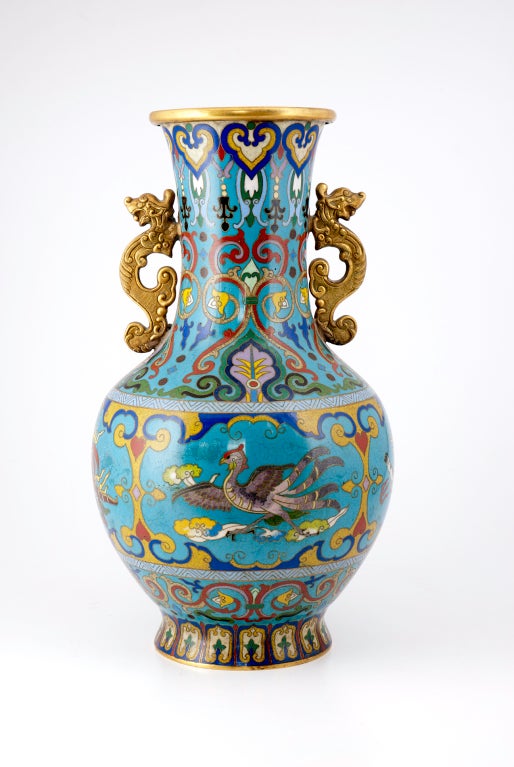 Lovely pair of Chinese Cloisonne vases with 6 character mark
impressed into base.