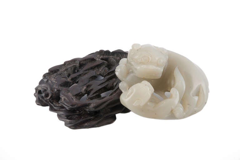 19th Century Qing jade lion and cub on Zitan stand