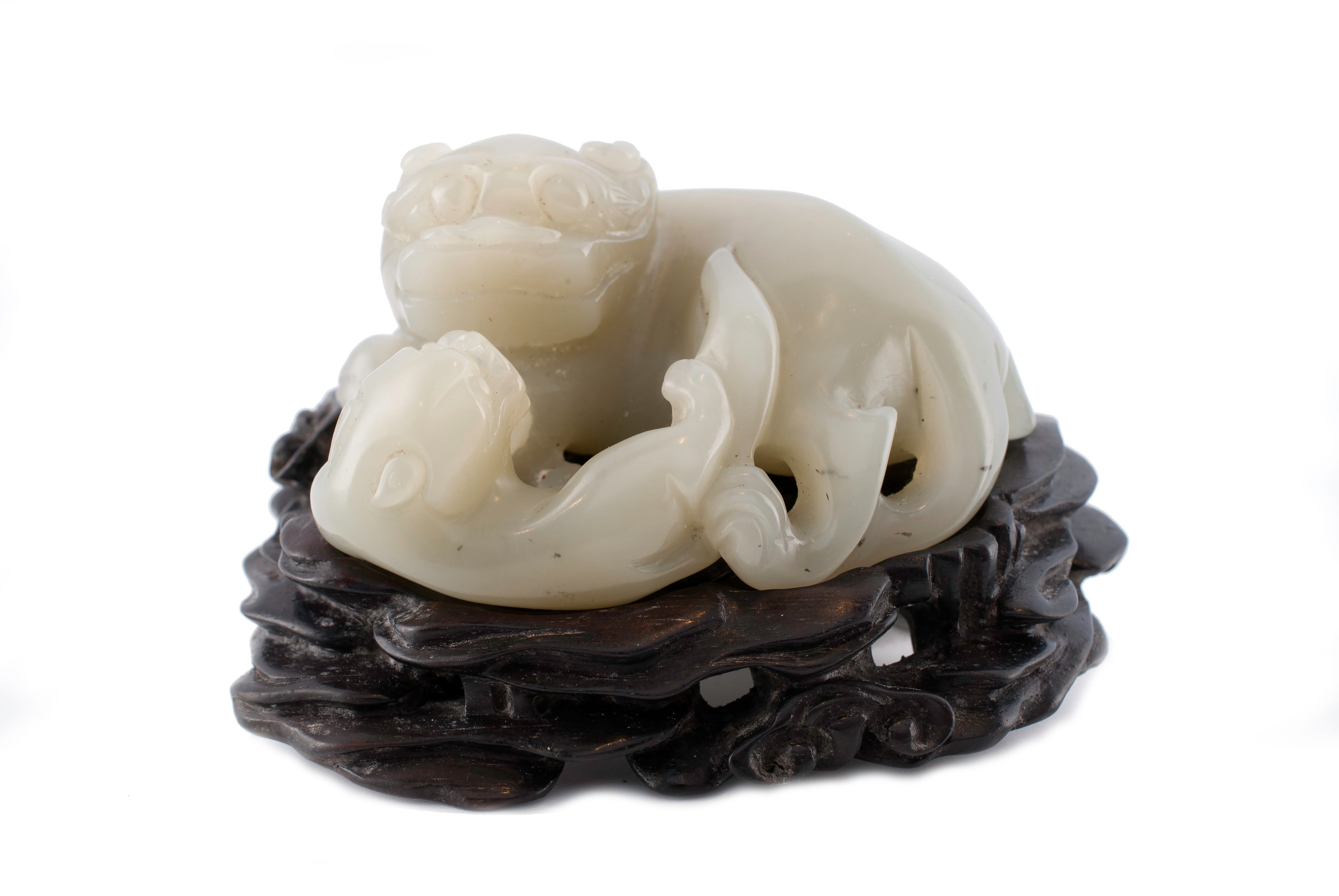 Qing jade lion and cub on Zitan stand