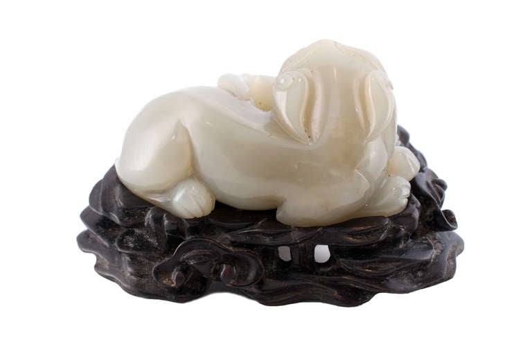 Chinese Qing jade lion and cub on Zitan stand