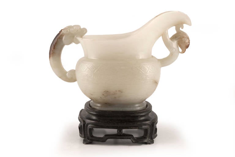 Russet jade libation cup from the Qing dynasty, with zitan stand.
Panache Antiques.