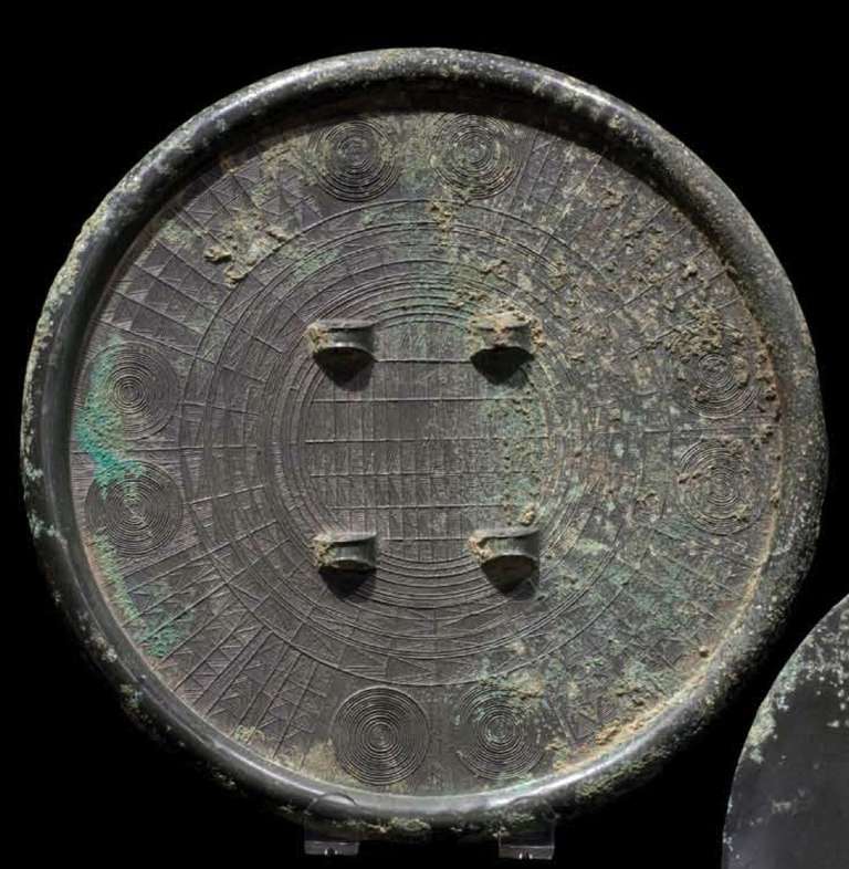 Archaic bronze Chinese mirror.