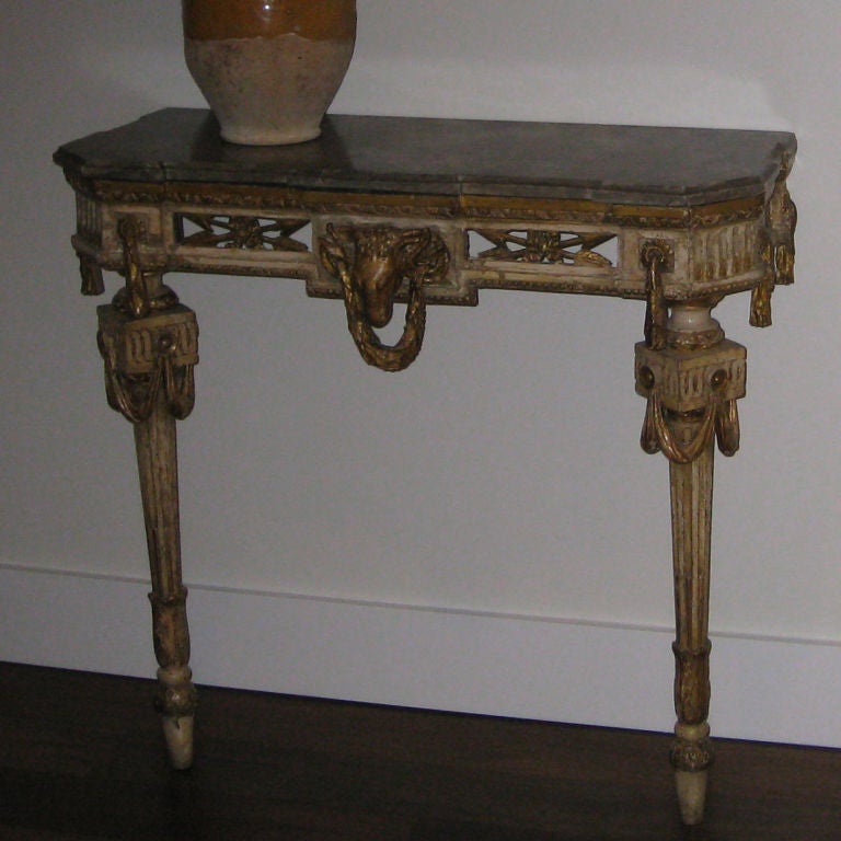 Wonderful 18th century console table with ram's head detail and original painted surface also original marble top. 
Panache antiques.