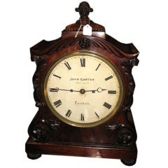 Mahogany bracket clock with signed face and movement.