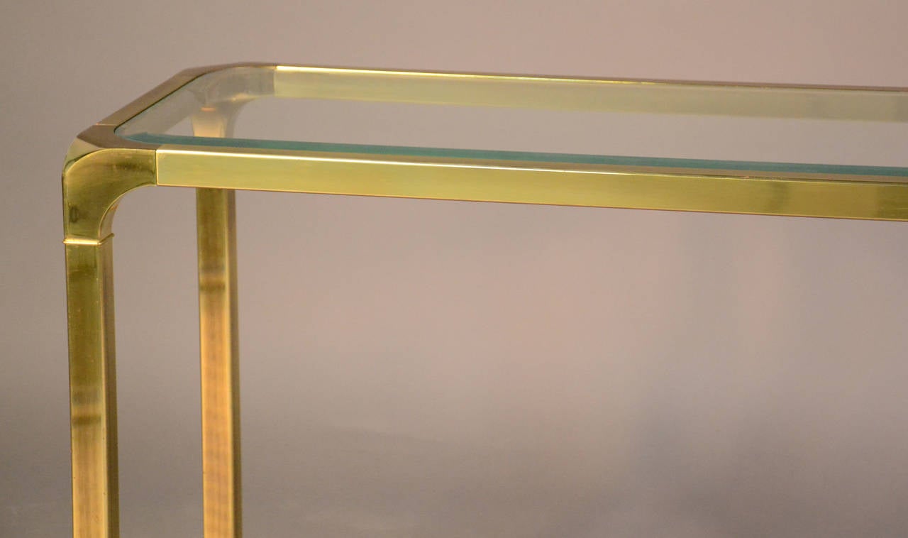 glass and brass console table