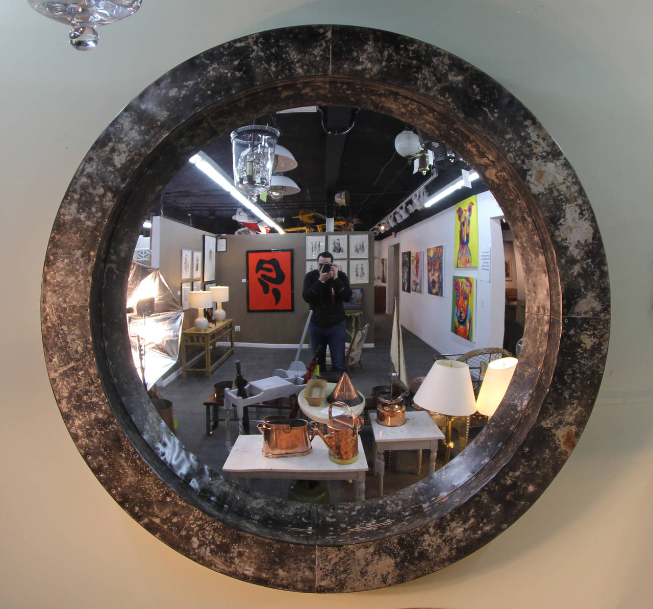 56 inch zinc frame with convex mirror. Nice patina, created by English artist.