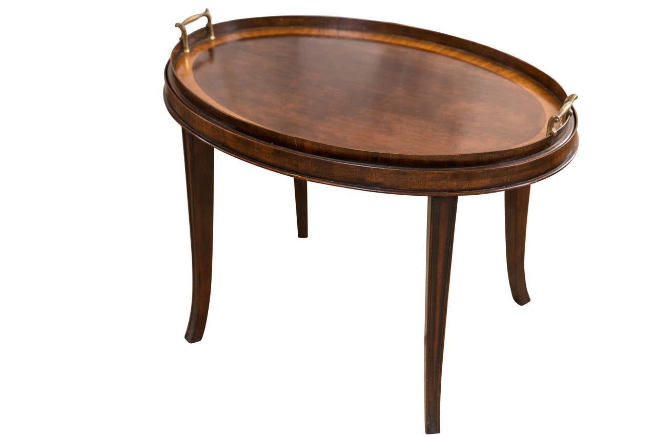 Lovely quality Edwardian mahogany oval tray side or coffee table, with satinwood crossbanding, (removable top) excellent condition. Dimensions: Height: 19 (48cm), width 26 (66 cm), depth 17 (45cm).