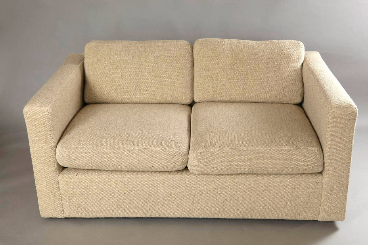 Loveseat designed by Milo Baughman for Thayer Coggin. Beautiful crème colored woolen fabric. Original Thayer Coggin labels. A matching three-seat sofa is also available.