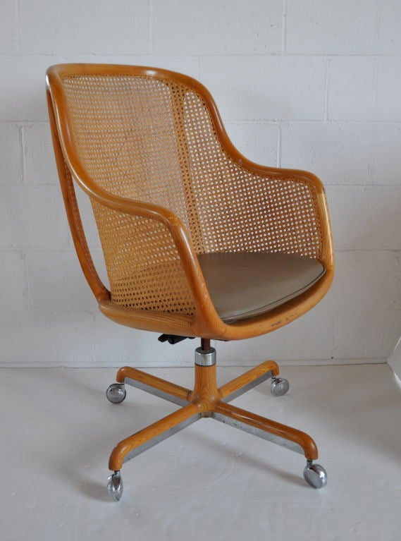 Desk chair in wood, caning and leather by Ward Bennett, Brickel.