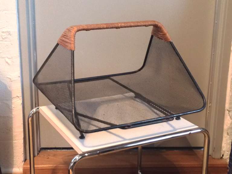 Magazine rack in black lacquered metal and rope attributed to Van Keppel Green.