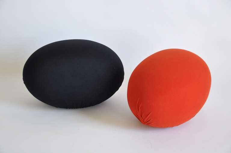 A red and black stool or ottoman by Denis Santachiara and Enrico Baleri, Cerruti Baleri, Italy. Made of removable CFC-free stretch polyurethane over a rigid interior structure and base.