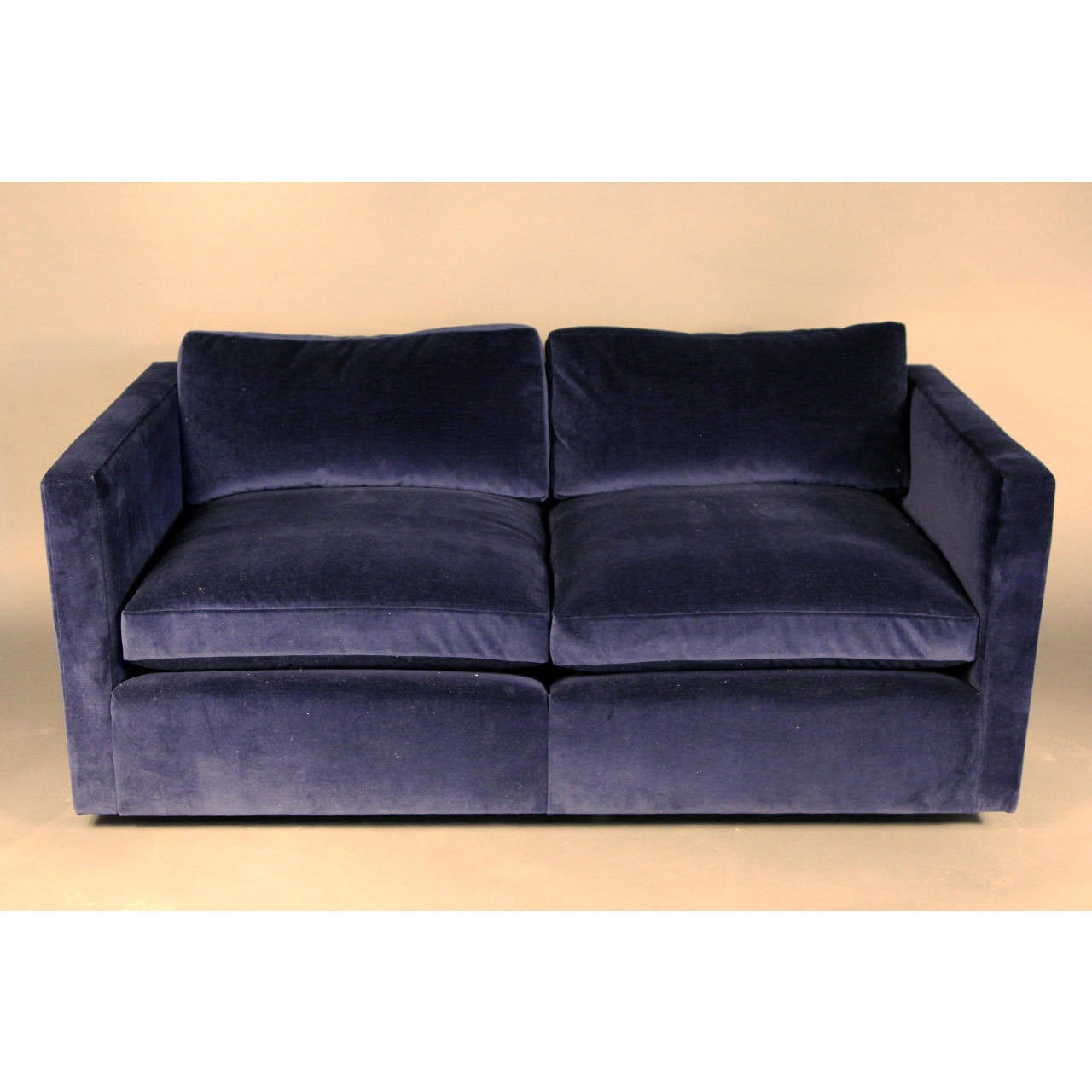 Beautiful newly upholstered in gorgeous navy blue velvet. This Knoll loveseat has clean lines and modern style. The pictures don't do this fabric justice, very vibrant and bring navy blue. With original Knoll label.

Matching sofa also available.