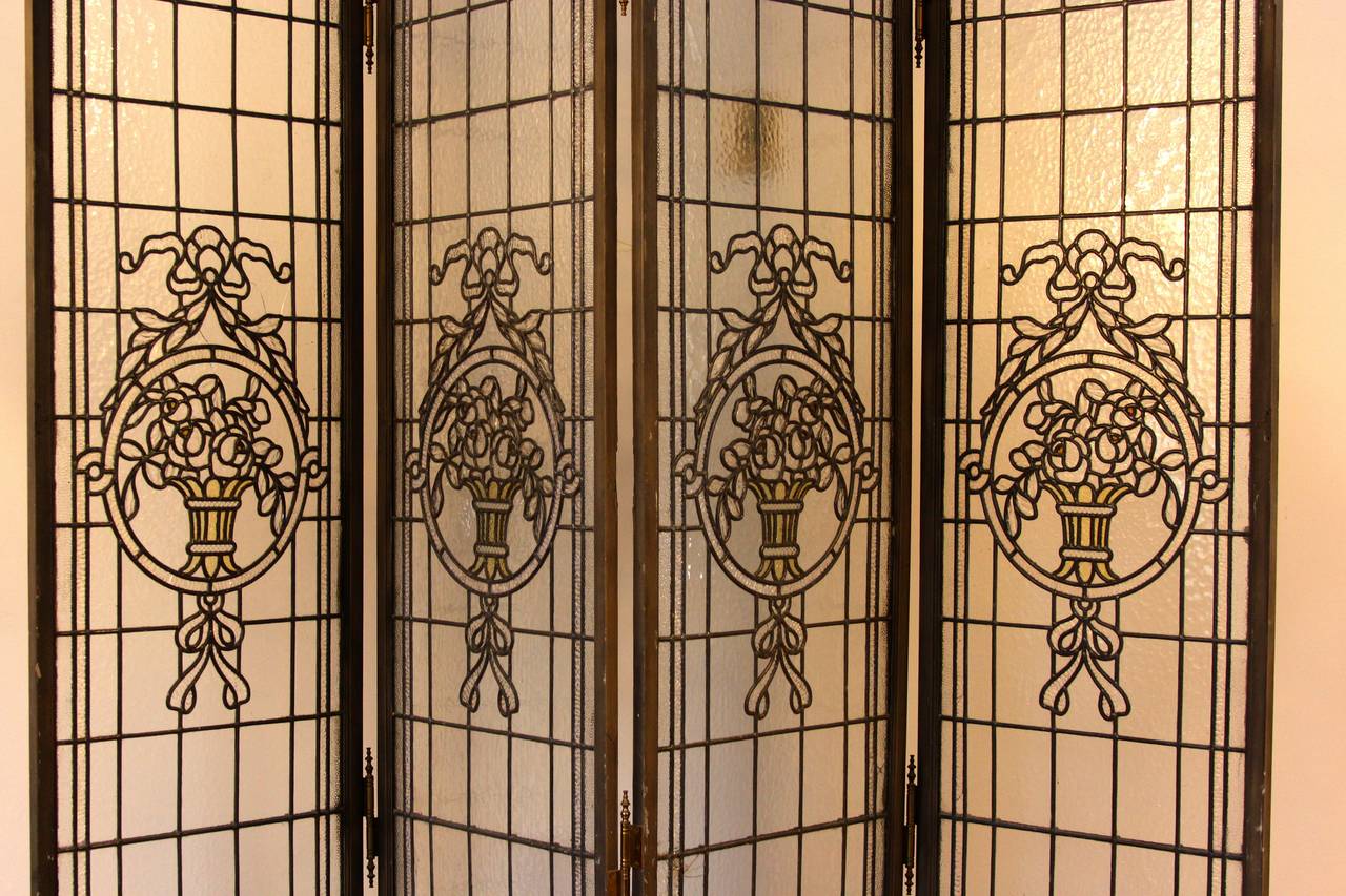 Four panel, leaded stained glass French screen with French bow knot motif.