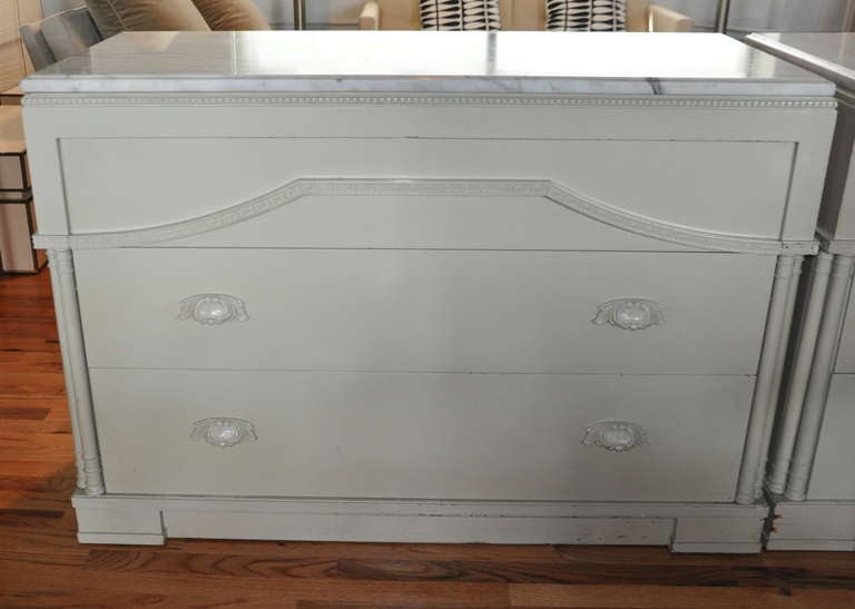 Cream lacquered dresser with Carrara marble top by James Mont. Rare signature, original condition.