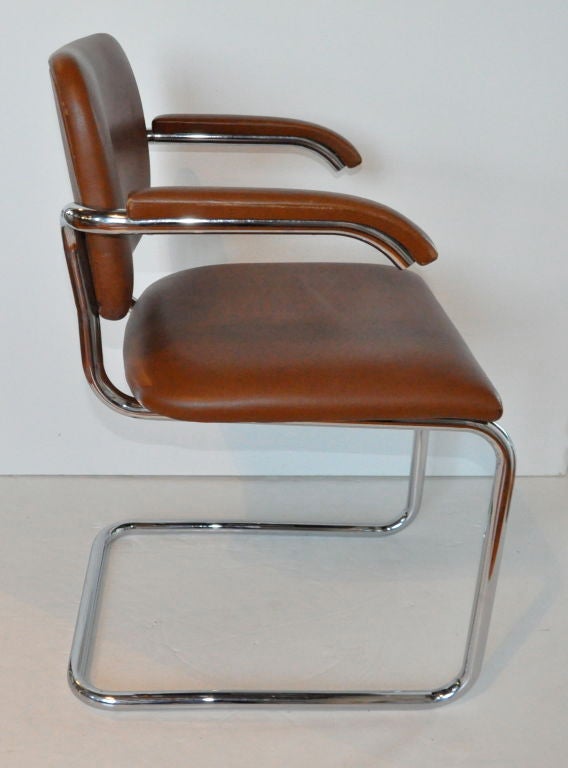 Set of four Cesca arm chairs in carmel leather and chromed steel by Marcel Breuer, Knoll. Designed in 1928, produced 1975.
