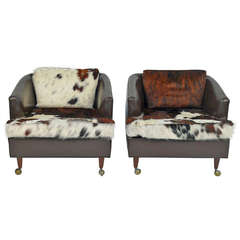 Pair of Leather Club Chairs Castored with New Cowhide Upholstery