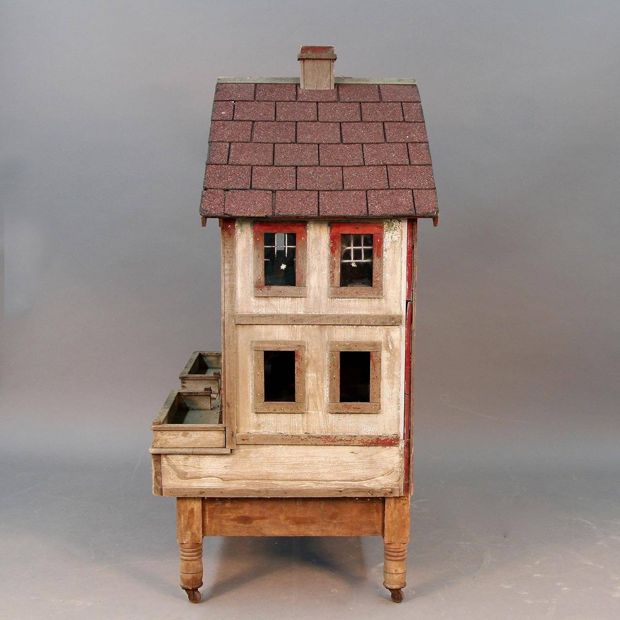 Grand handcrafted early 20th century one of a kind aviary doll house is complete with window openings on all four sides and a working front door! This wooden structure has aged to a truly lovely patina. The entire front opens for easy access and the