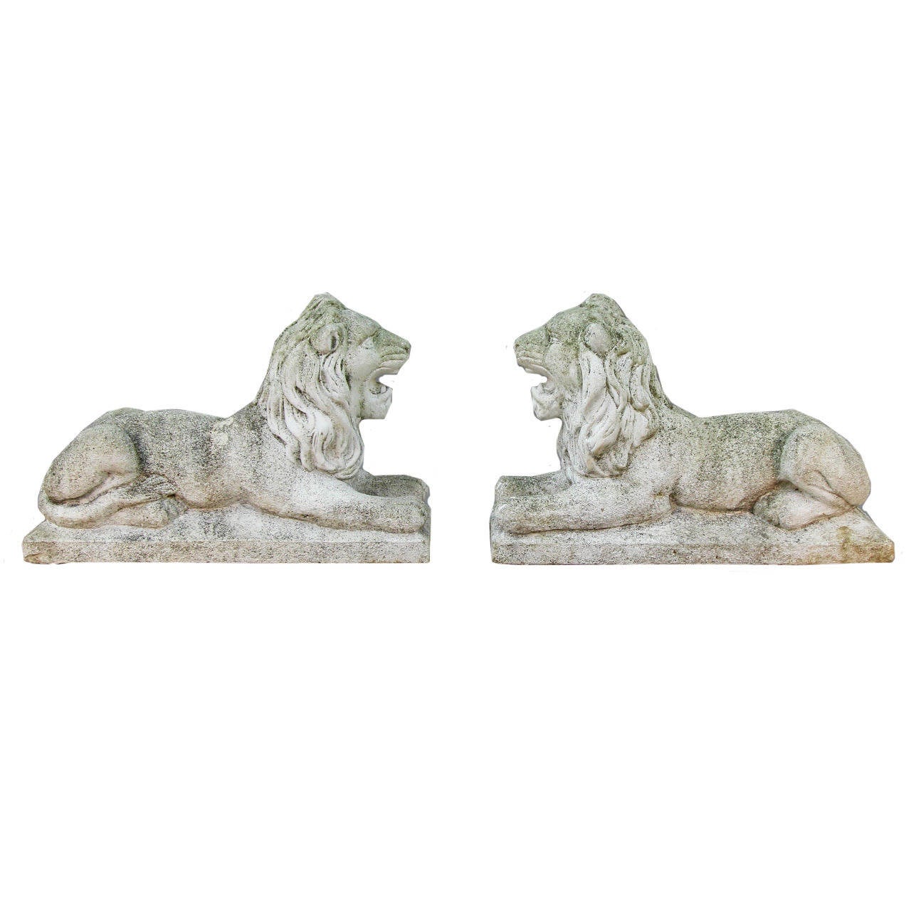 Grace your entrance or garden with this wonderful pair of or distinctive recumbent lions. Heavy and well-defined concrete casting with great age and patina in excellent vintage condition.