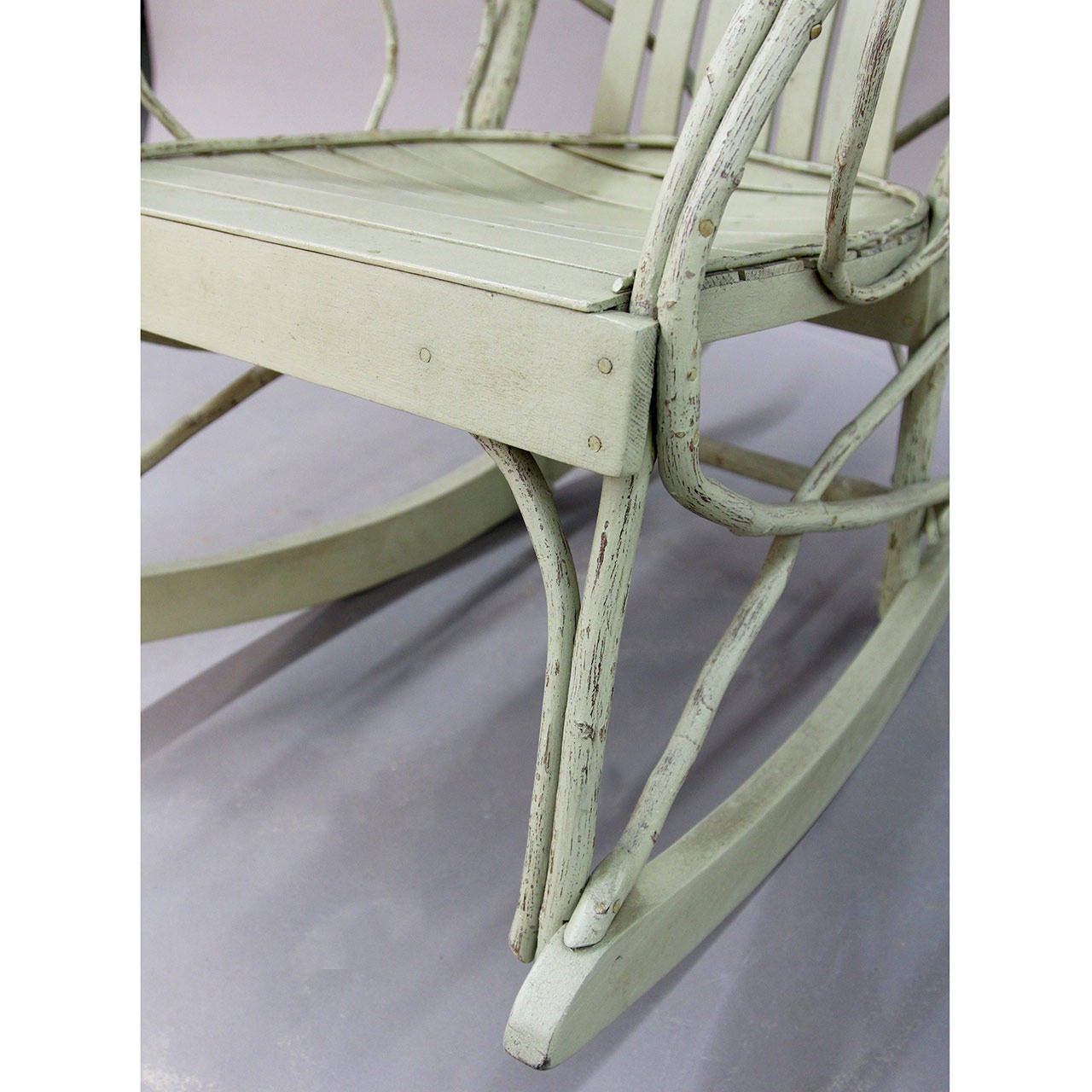 Sturdy and very comfortable handcrafted rocker in the Adirondack twig style. Superb condition. Wonderful piece of Americana to enjoy on a porch or deck. Add a cushion and it’s charming in a nursery!