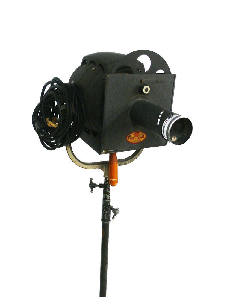 Add a bit of  of old Hollywood with Bardwell McAllister FOCO-SPOT movie lights , set on a rolling tripod bases which telescopes to varying height levels.