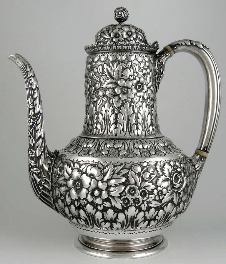 Tiffany & Co. Sterling Coffee pot
MAKERS serial date 1888.

The finest Repousse work one can expect.  
Of course Tiffany would have to be the one doing it.