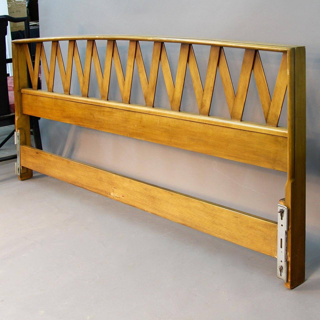 Gorgeous Mid-Century Modern kind size headboard by Paul Frankl. Iconic Paul Frankl zigs zagging. Honey brown stained color.