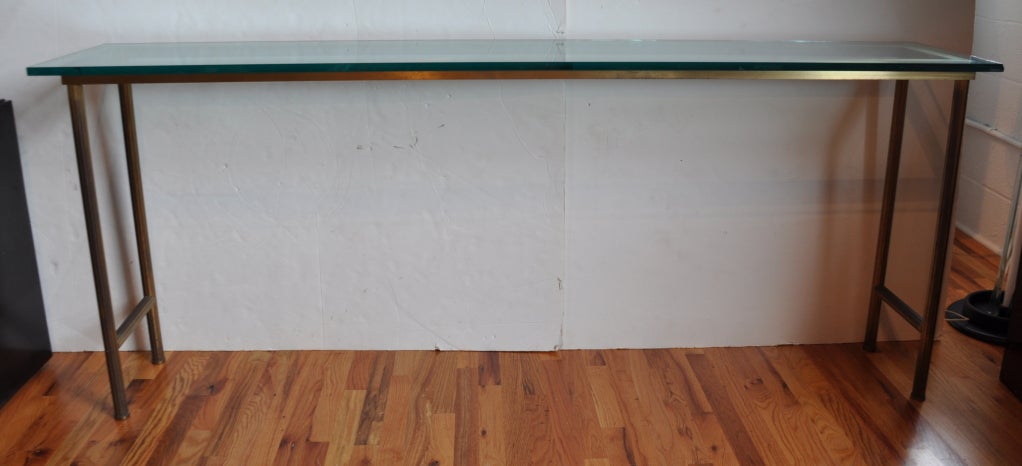 long narrow glass console table