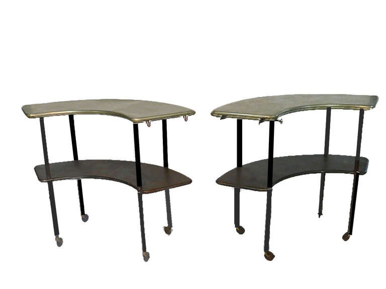 Stainless steel wrapped top, 2 piece connectable garden table.  Configurations can be semi-circle, serpentine or pair of demi-lune.  Hand welded, steel tubing, on casters, wrapped with stainless steel top.  Imported from Porte de Clignancourt,