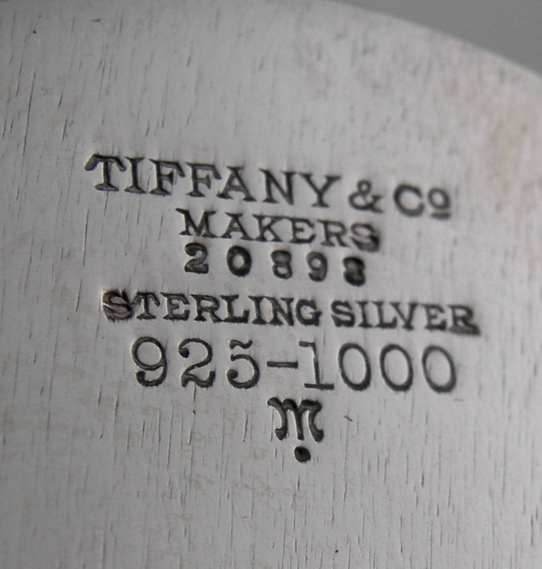 Tiffany & Co. sterling martini shaker.
Makers serial 20898 (1928).

Would do as well as a flower vase or julep cup.