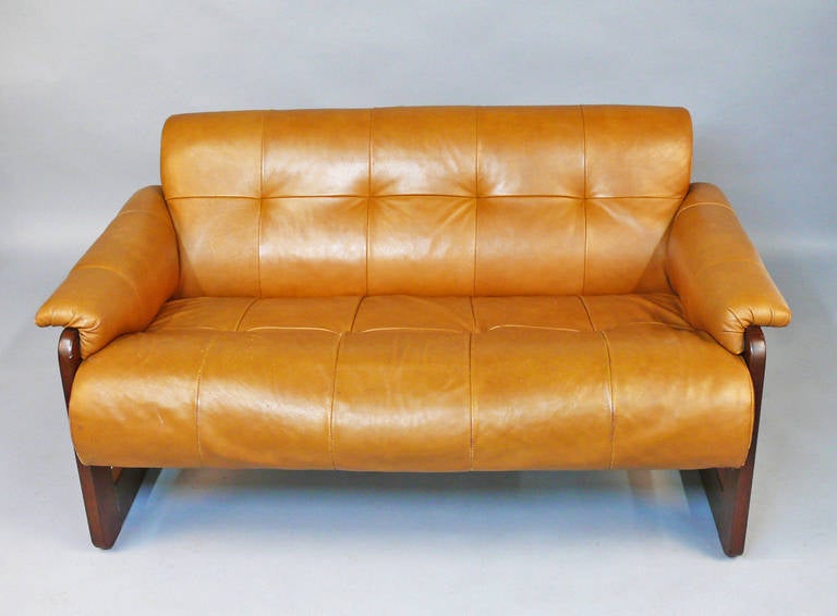Vintage Rosewood Frame with Camel Colored Leather Percival Lafer Love Seat / Settee.  Great vintage mid-century style with clean lines.  Leather has some minor scratches but is in good vintage condition.

Sofa also available, discount for both.