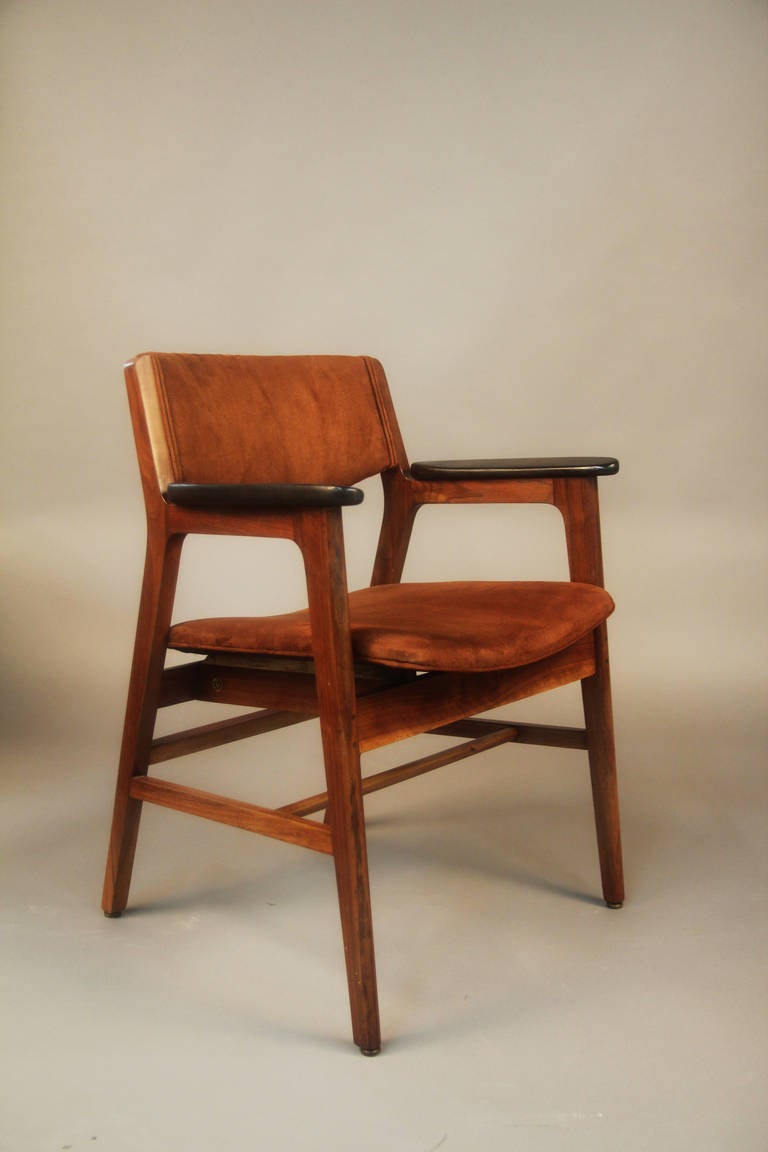 Beautiful pair of mid-century W. H. Gunlocke Arm Chairs.  Suede Upholstery in great condition.  Nice two tone walnut frame.