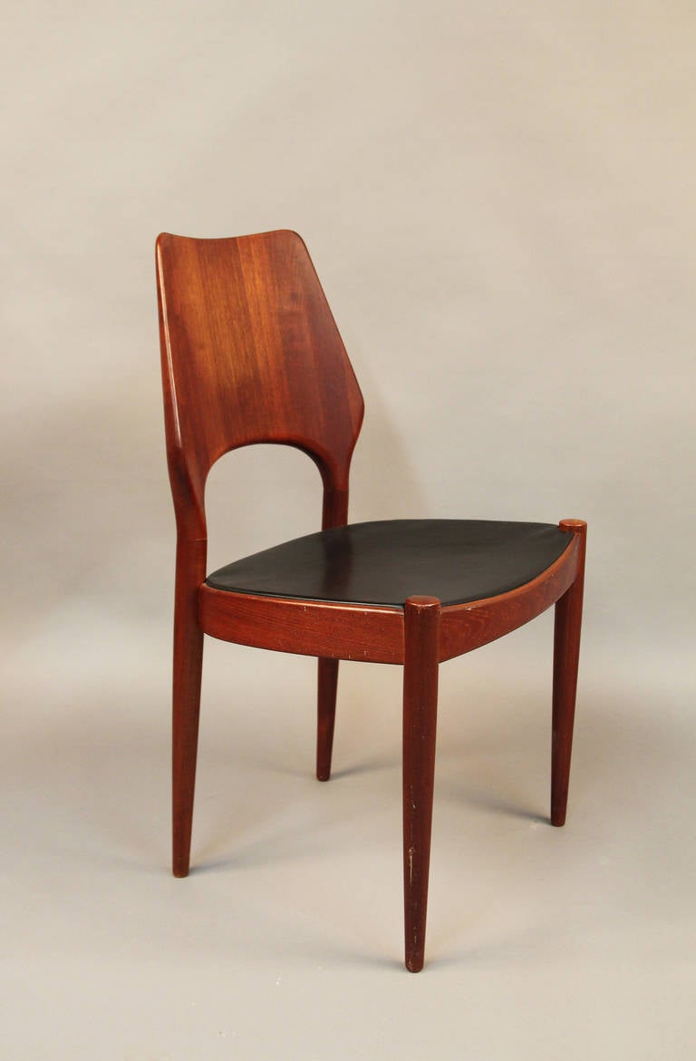 Very rare, and beautiful set of 6 dining chairs by Hovmand Olsen for Mogens Kold.  Teak with with original black leather seat cushions.  Midcentury Danis Modern, beautiful lines.  A stunning set.