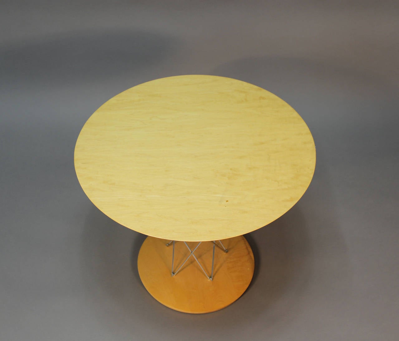 Iconic Noguchi Cyclone table by Modernica. Child size with beechwood laminate top and chrome supports.