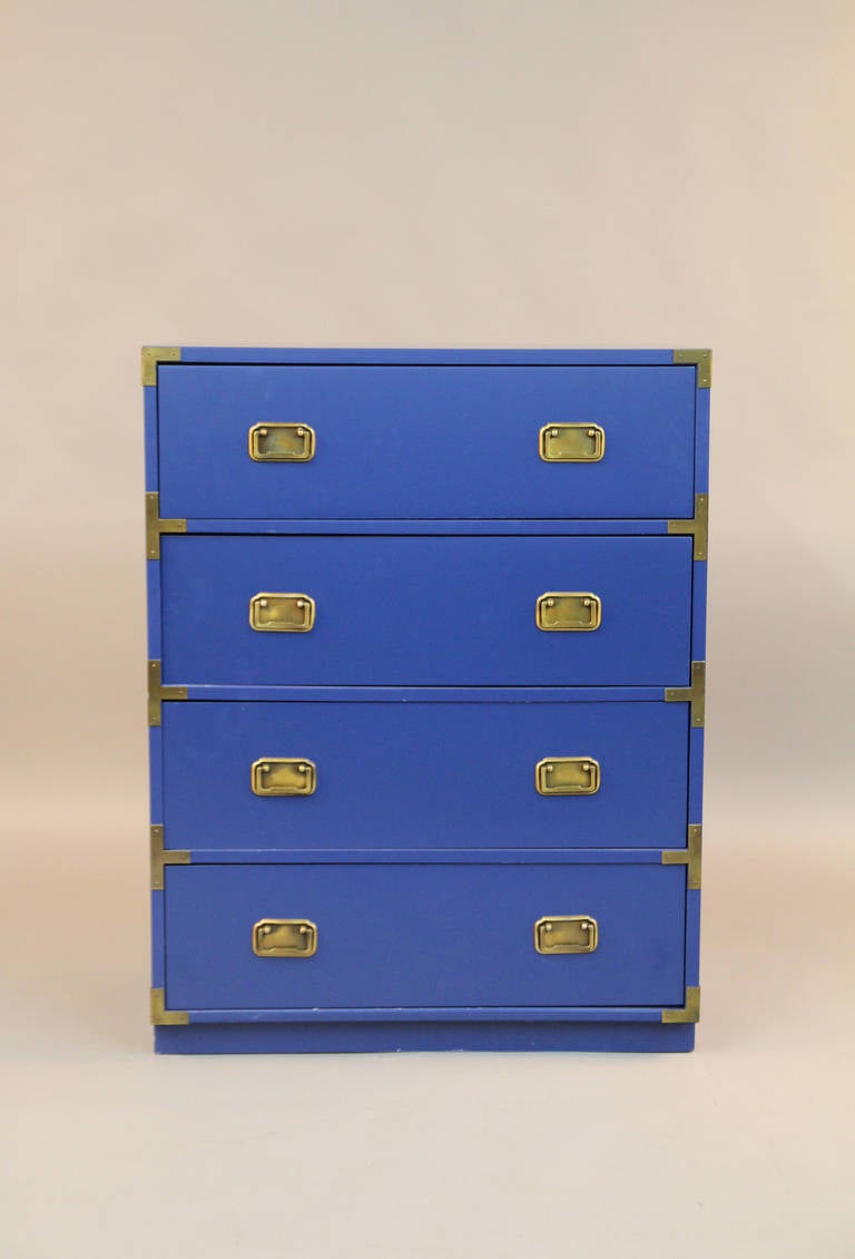 This is a newly lacquered campaign style chest with four drawers and bronze hardware.