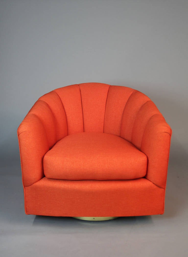 Pair of Orange Channeled Swivel Club Chairs with Brass
