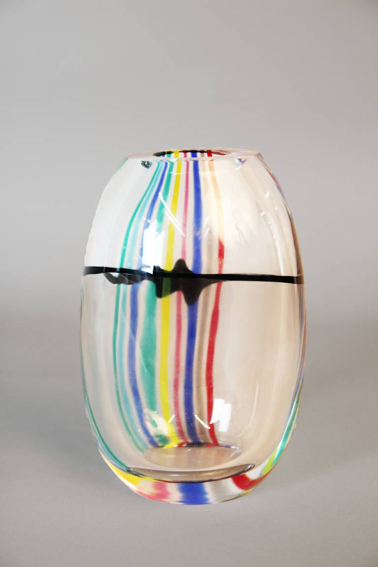 Large clear glass ovoid shaped vase with vertical polychrome applied cane work and a black face swatch around the circumference. Designed by Livio Seguso, produced by Seguso A.V. Signed on base, also with label.