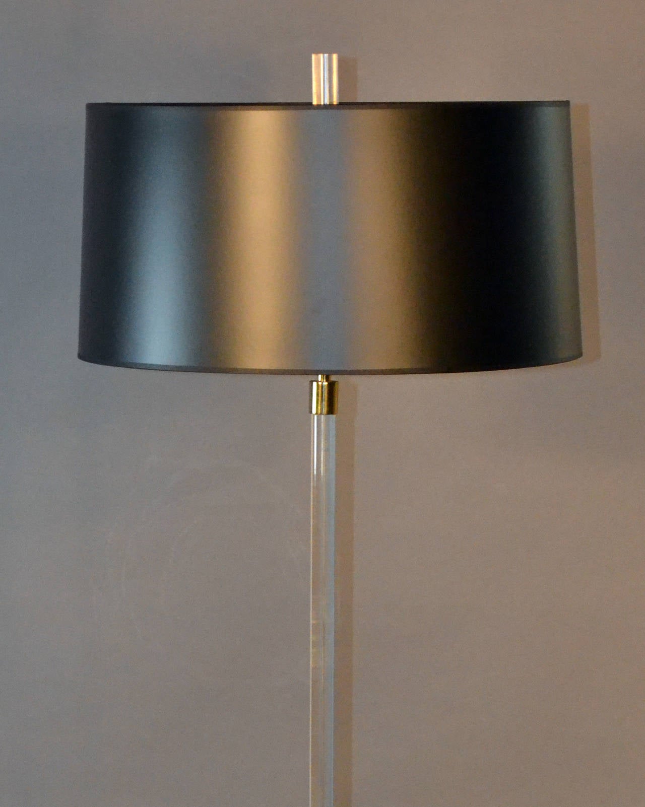 brass floor lamp with black shade