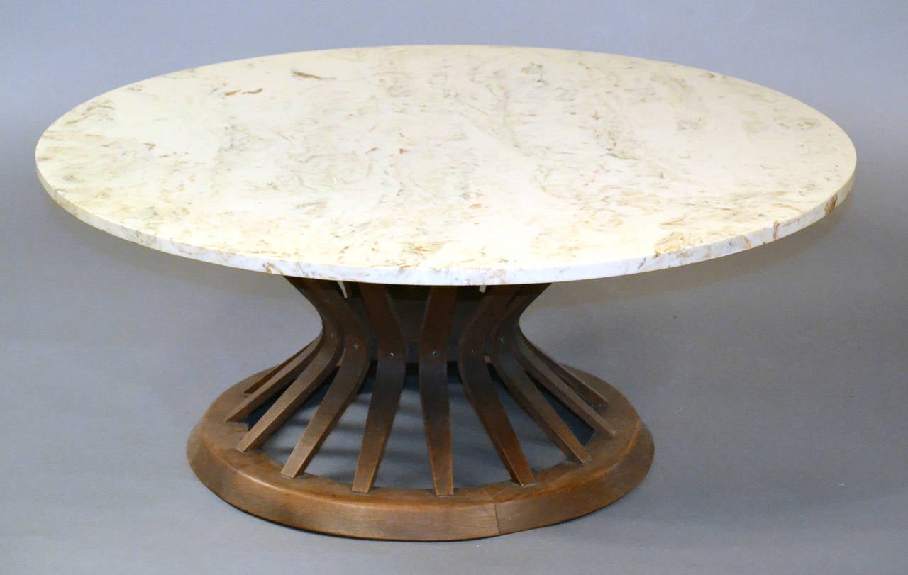 Very cool design.  This is the Sheaf of Wheat Coffee table by Edward Wormley for Dunbar.  Has marble top.