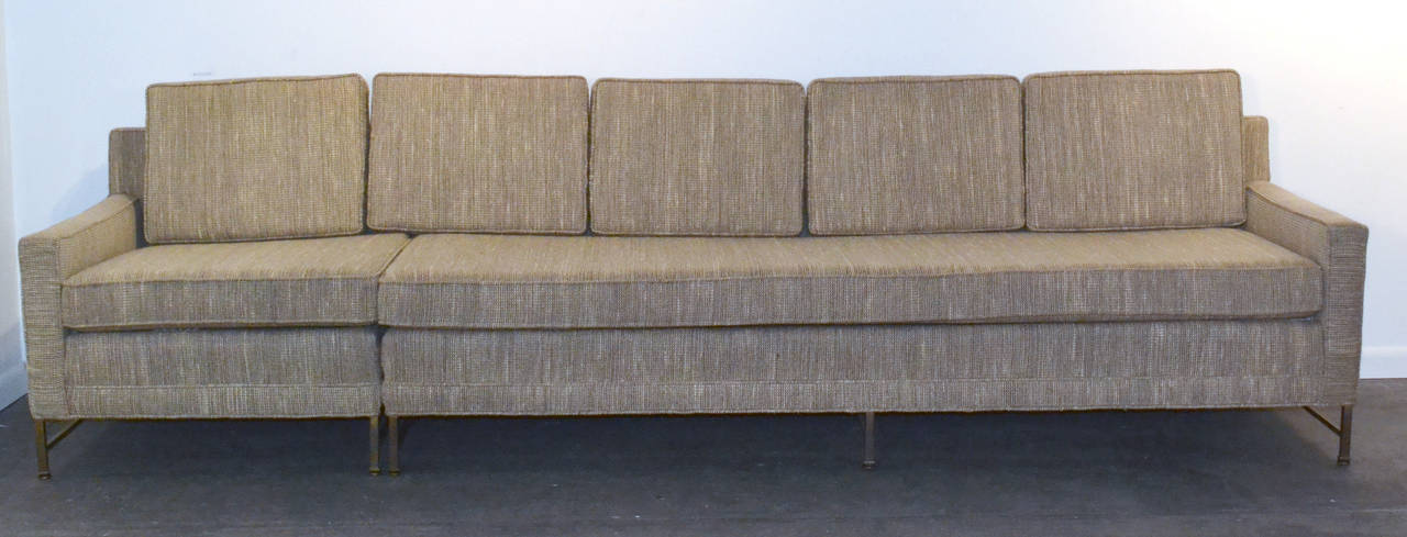 Mid-Century Paul McCobb Sectional 2 piece sofa.  Has full length sofa and single chair.  Can be place in L shape with side table or one long sofa with arms on both ends.  Has brass legs and original fabric.