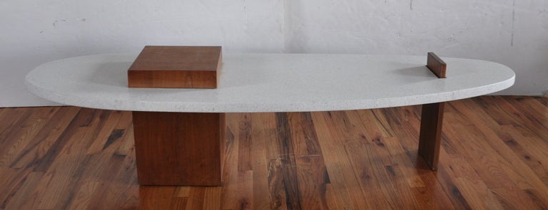 Surfboard coffee table in terrazzo marble, walnut and rosewood by Harvey Probber.