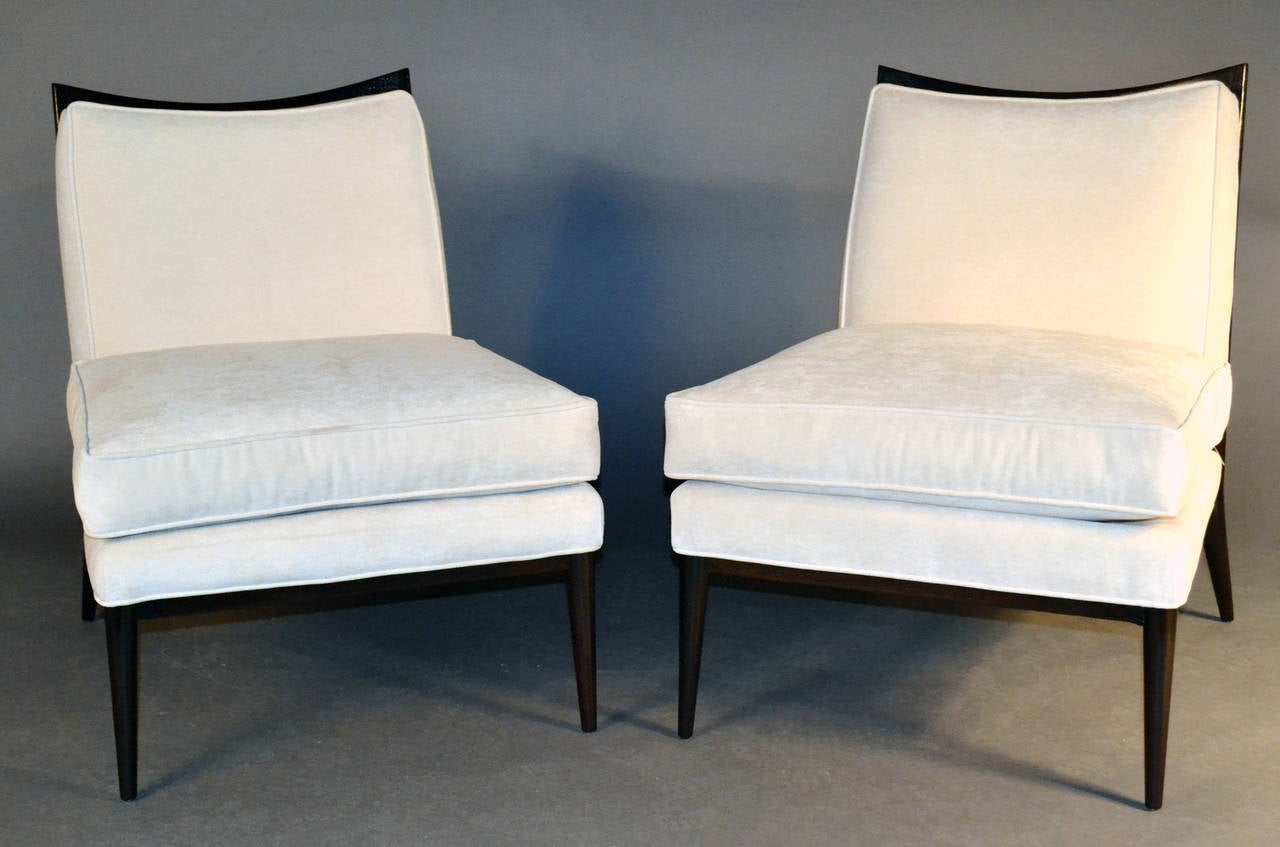 Model 1320 armless lounge chairs. Walnut frame, chocolate lacquer with cream velvet upholstery.
