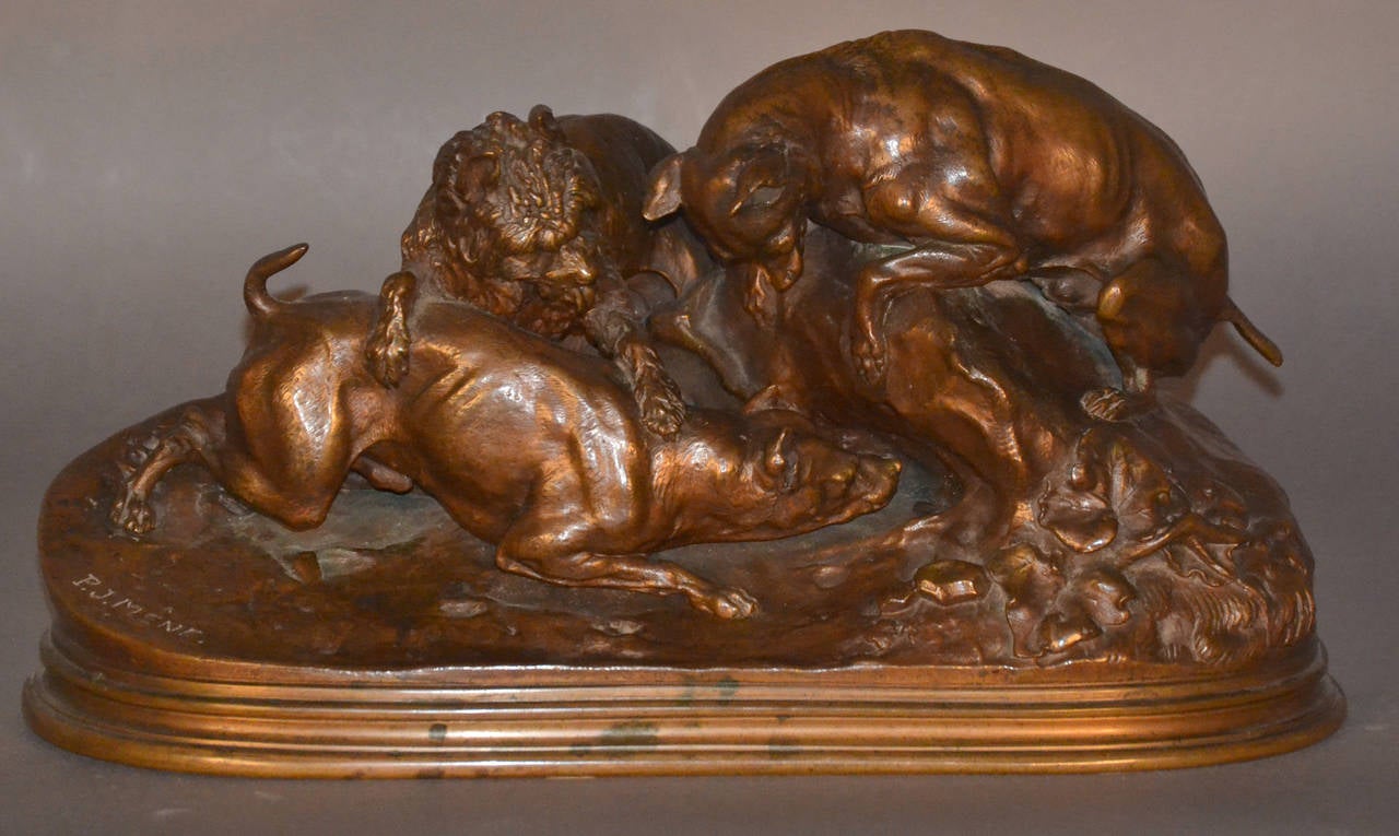 P.J. Mene’s fine French bronze “La Chasse Au Lapin” depicting a grouping of 1 terrier and 2 hounds on the scent of a rabbit at its burrow. Earlier cast, bronze with fine detail, composition, and chasing with a lovely brown patina. Signed P. J. Mene